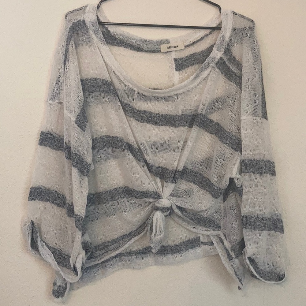 Off the shoulder distressed knit top